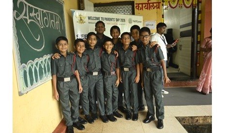 Cadets gathered at the school entrance for the event