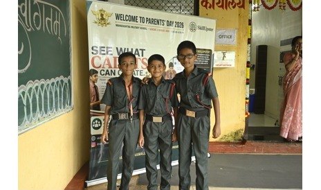 Cadets in front of the event banner